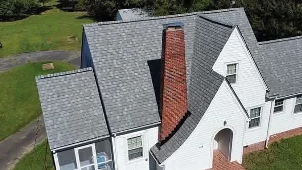 Revive Roofing project manager overseeing a Charleston roof replacement